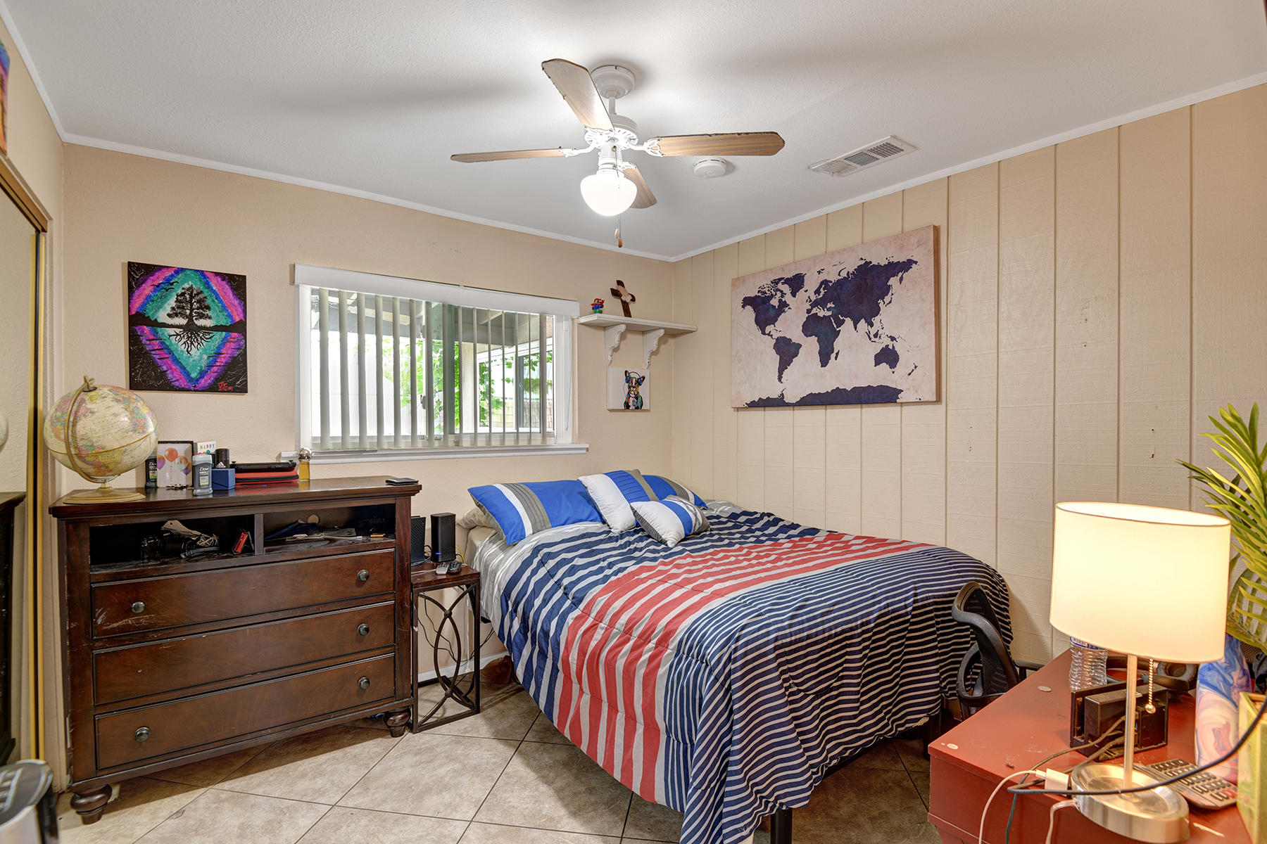 81850 Victoria Street Indio, CA 92201 - Photo 9 of 17 a bedroom with a bed and a window