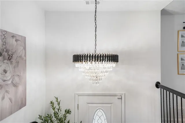a close view of a utility room with dryer and washer
