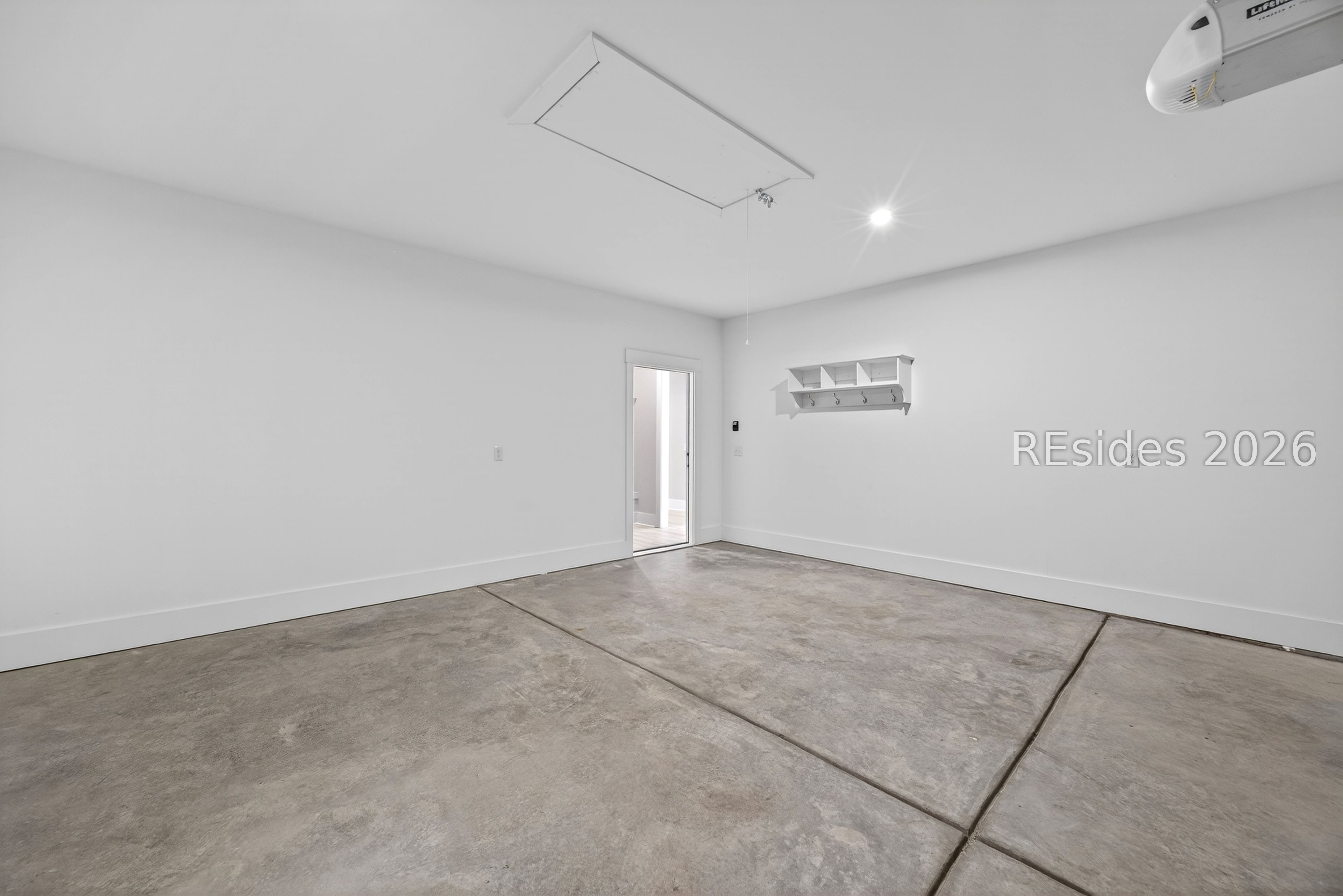 539 Sunfish Way Bluffton, SC 29909 - Photo 46 of 71 Garage with 4' extension & attic pull down stairs