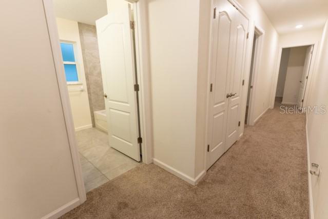 5050 Southwest 91st Place Ocala, FL 34476 - Photo 18 of 33 a view of a bathroom with a glass door