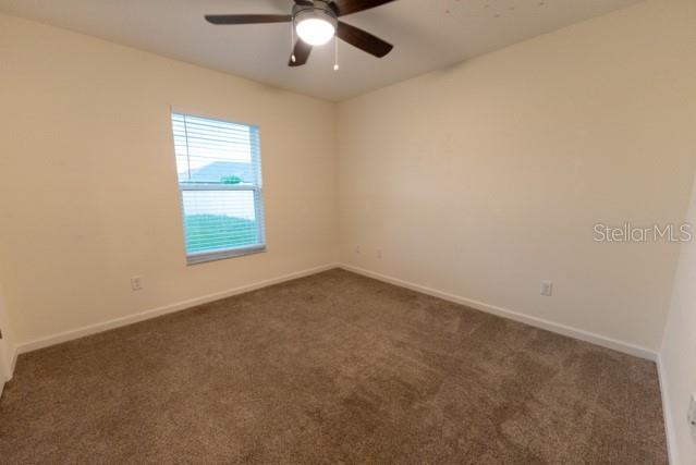 5050 Southwest 91st Place Ocala, FL 34476 - Photo 23 of 33 an empty room with a window