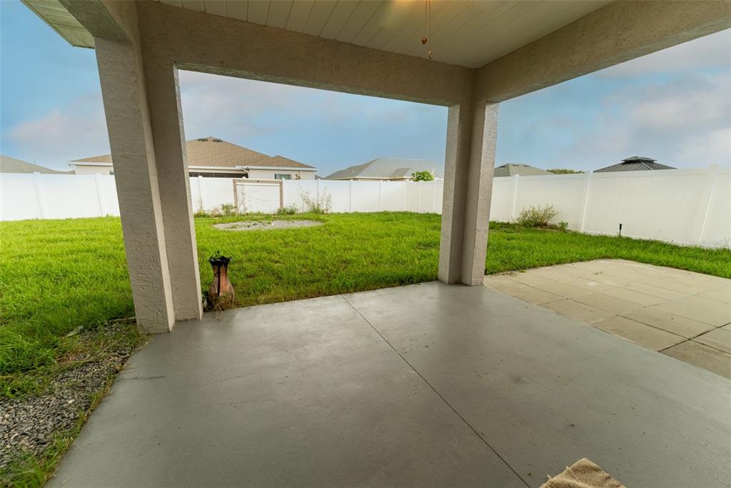 5050 Southwest 91st Place Ocala, FL 34476 - Photo 27 of 33 a view of a house with backyard and garden