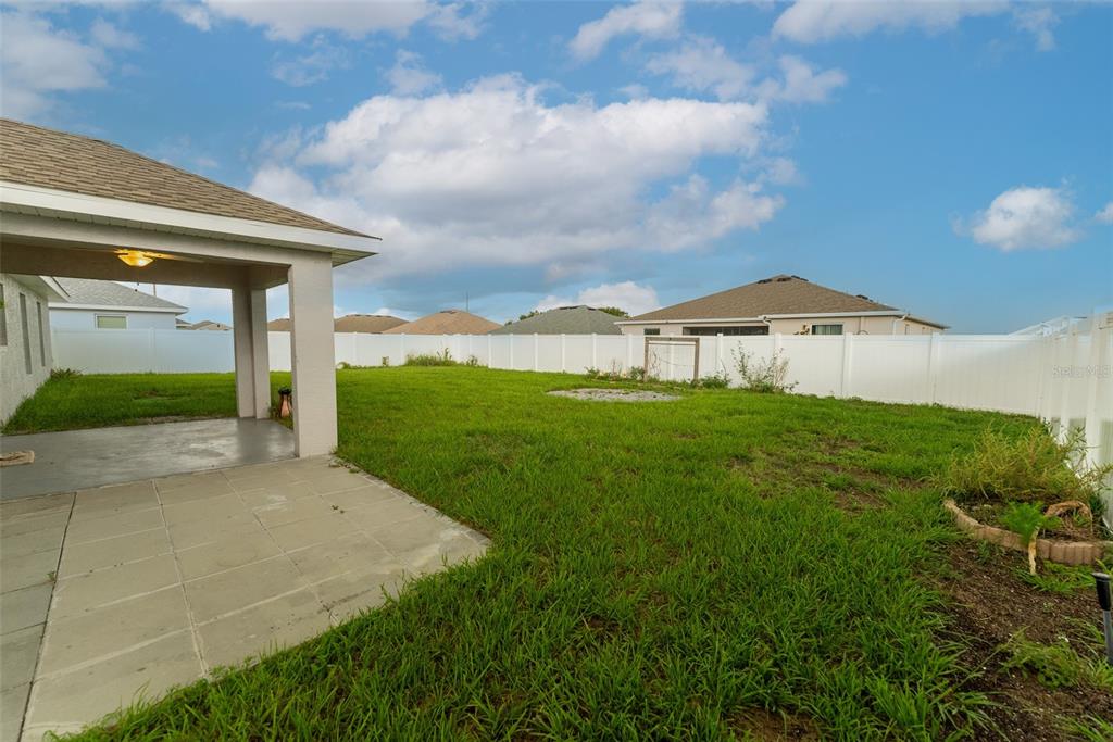 5050 Southwest 91st Place Ocala, FL 34476 - Photo 28 of 33 a front view of a house with garden