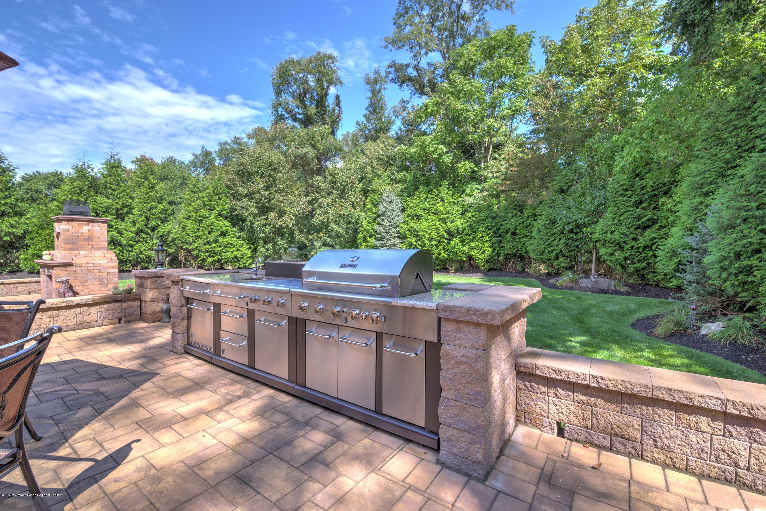 136 Millhurst Road Manalapan, NJ 07726 - Photo 42 of 44 042_PATIO KITCHEN