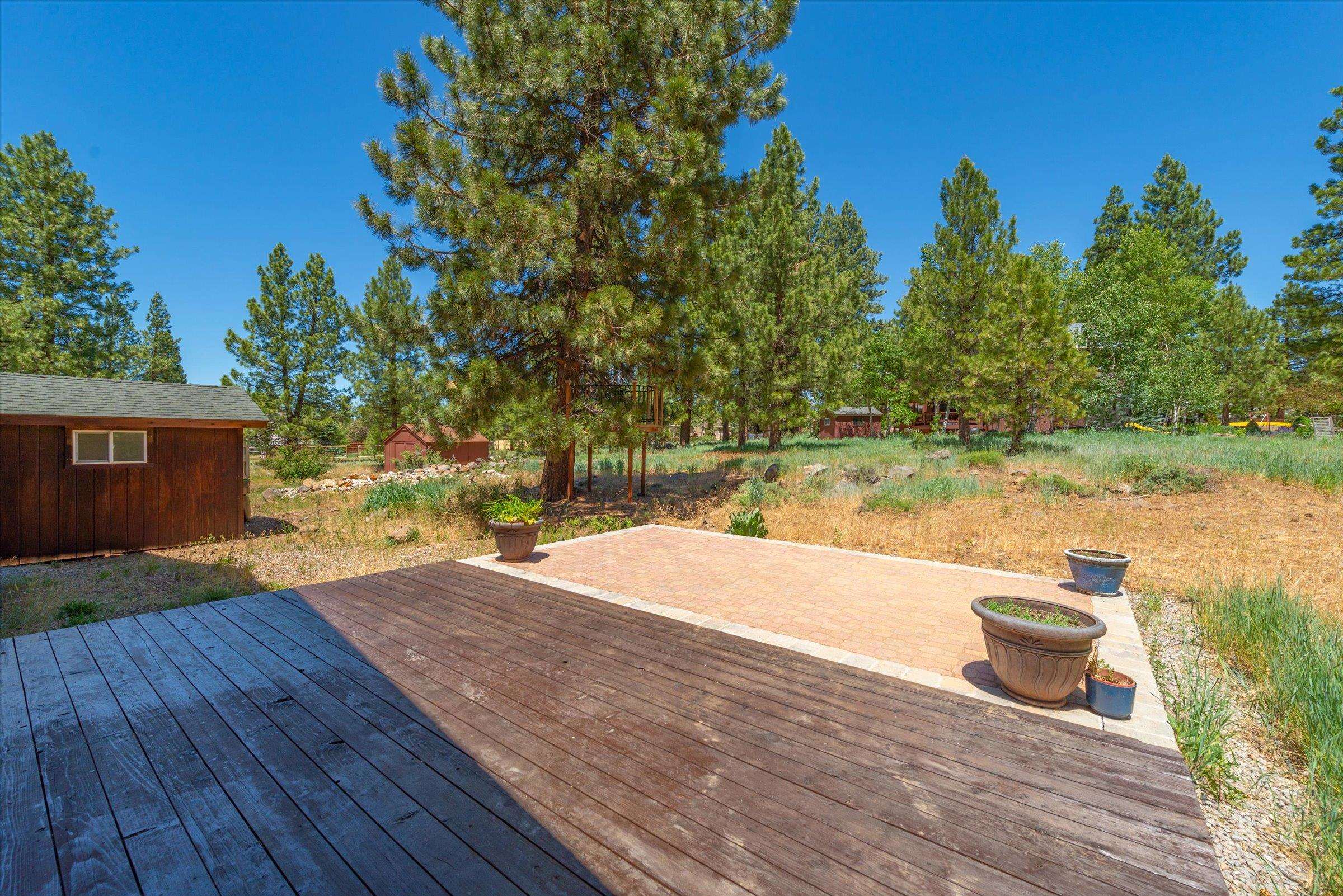 10309 Evensham Place Truckee, CA 96161 - Photo 2 of 21 a view of a house with a yard