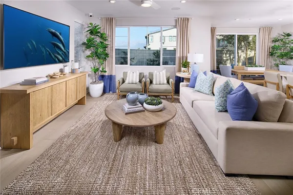 a living room with furniture and a table