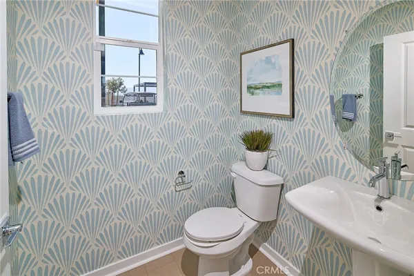 a bathroom with a toilet and a sink