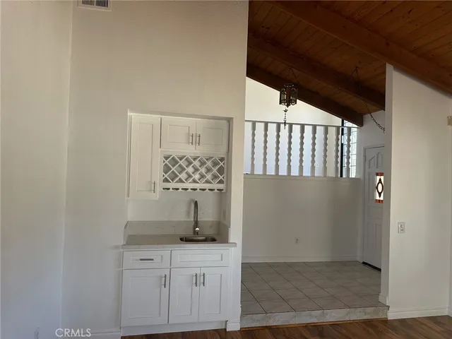a view of cabinets and window