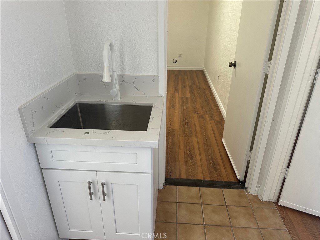 16485 Wintun Road Apple Valley, CA 92307 - Photo 19 of 36 a view of a kitchen from a hallway