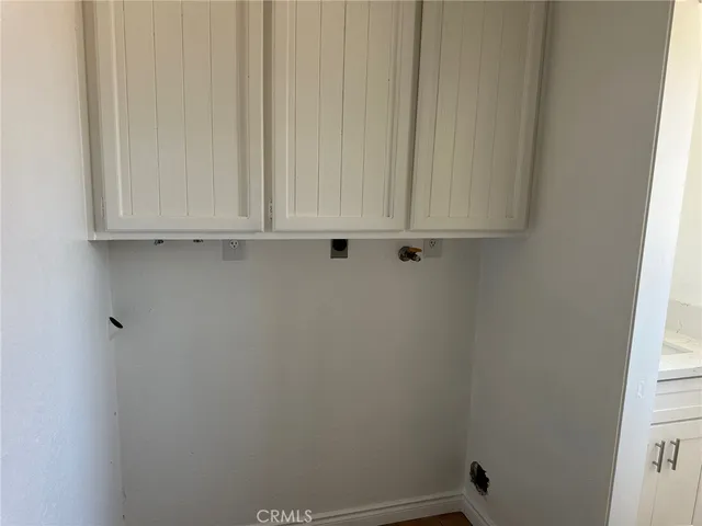 a bathroom with a sink and a window