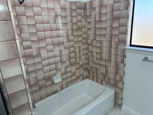 a bathroom with a bathtub
