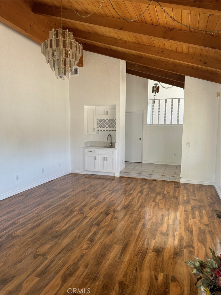 16485 Wintun Road Apple Valley, CA 92307 - Photo 27 of 36 a view of empty room with wooden floor