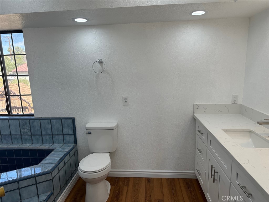 16485 Wintun Road Apple Valley, CA 92307 - Photo 29 of 36 a bathroom with a sink and toilet