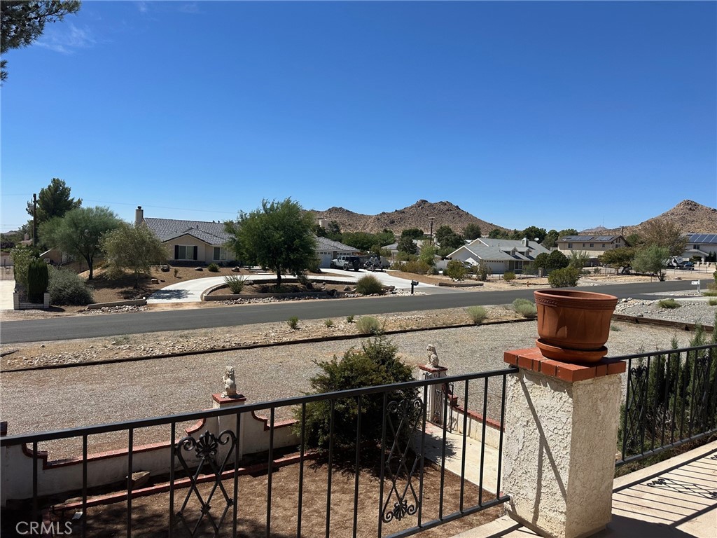 16485 Wintun Road Apple Valley, CA 92307 - Photo 6 of 36 a view of a terrace with chairs