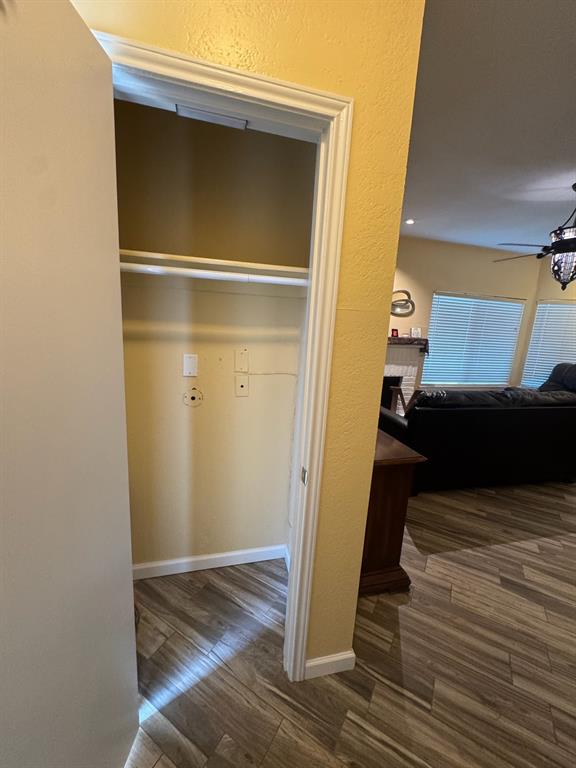 18040 Midway Road, Unit 145 Dallas, TX 75287 - Photo 2 of 19 a view of a bedroom from the hallway