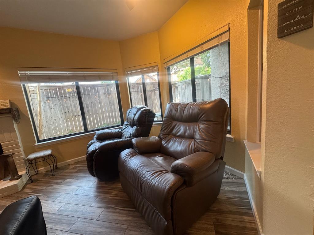 18040 Midway Road, Unit 145 Dallas, TX 75287 - Photo 6 of 19 a living room with furniture and a flat screen tv