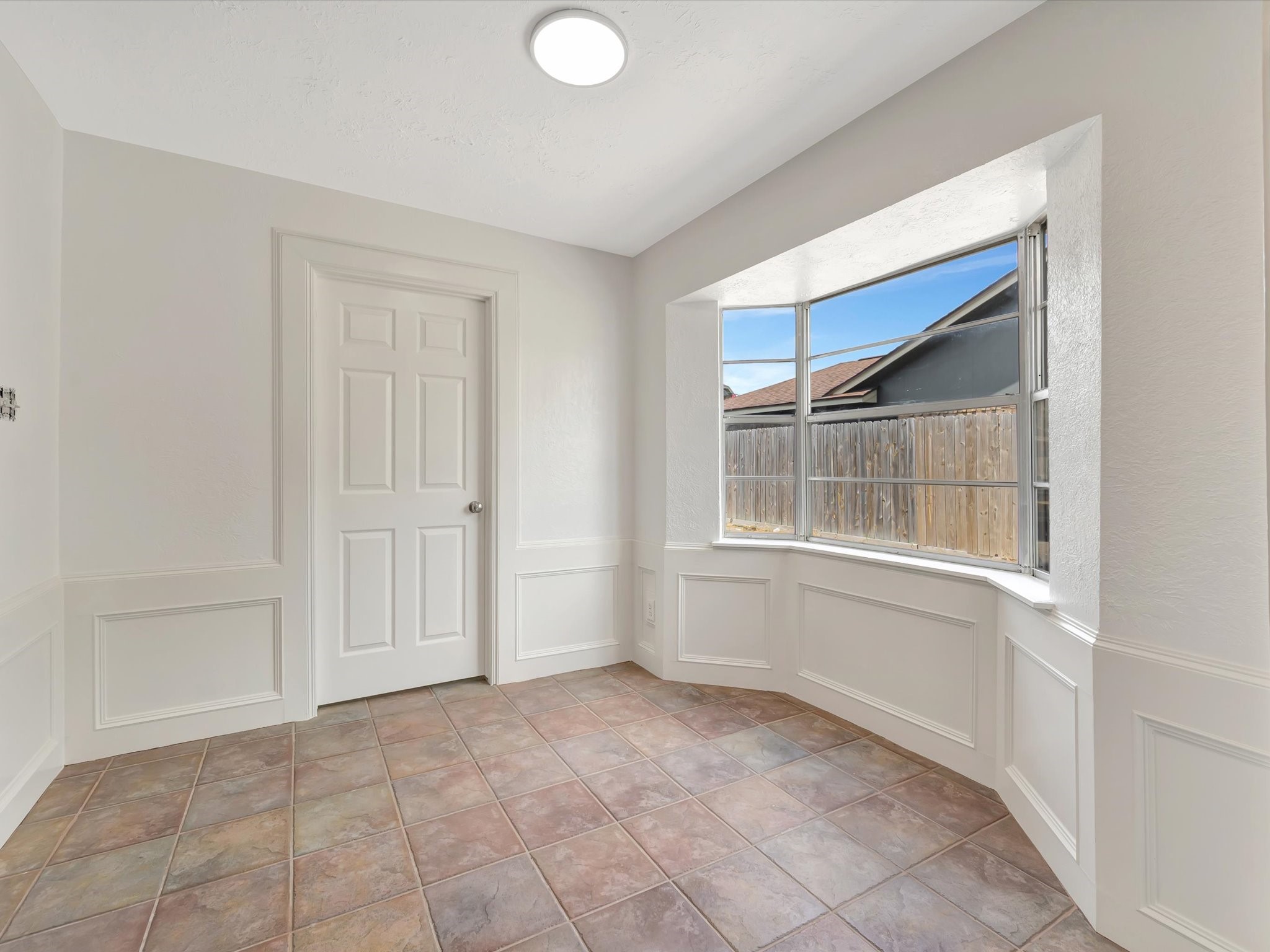 10340 Rocky Hollow Road La Porte, TX 77571 - Photo 14 of 38 Bright breakfast area featuring abundant natural light.