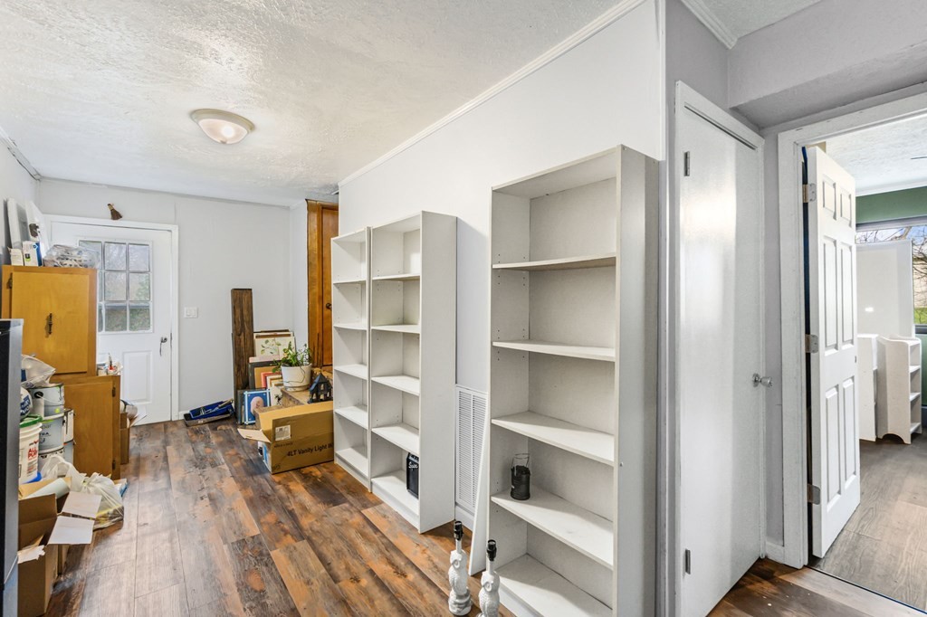 939 Watauga Road Cookeville, TN 38506 - Photo 11 of 28 a view of walk in closet with clothes and shoes