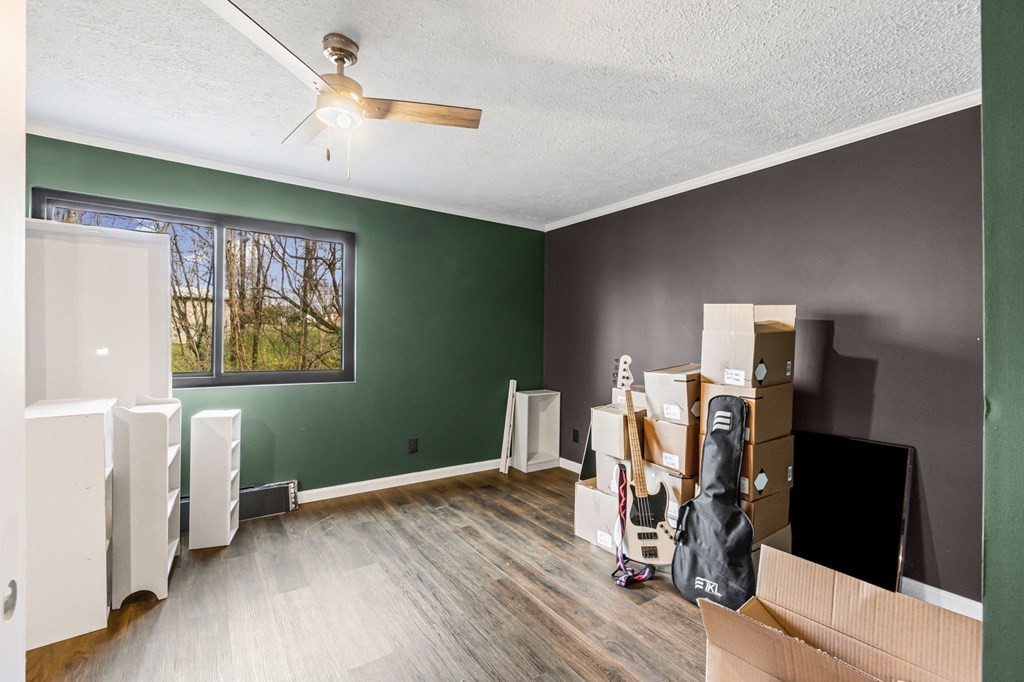 939 Watauga Road Cookeville, TN 38506 - Photo 13 of 28 a view of a workspace with furniture and wooden floor