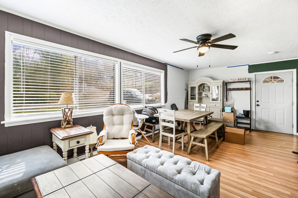 939 Watauga Road Cookeville, TN 38506 - Photo 6 of 28 a living room with furniture and wooden floor