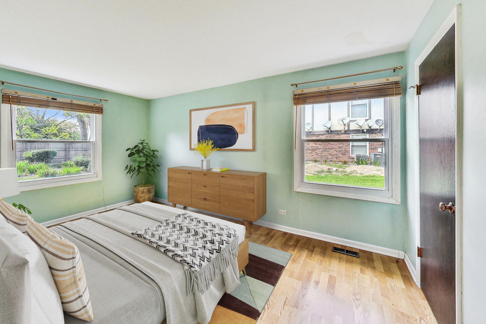 2980 Northampton Drive, Unit D1 Rolling Meadows, IL 60008 - Photo 19 of 35 a bedroom with a bed and a window