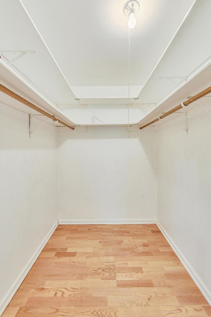2980 Northampton Drive, Unit D1 Rolling Meadows, IL 60008 - Photo 20 of 35 a view of a room with wooden floor