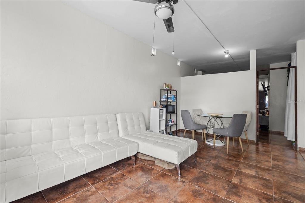 228 Calle 25 Guaynabo, Guaynabo 00969 - Photo 2 of 10 a living room with furniture and wooden floor