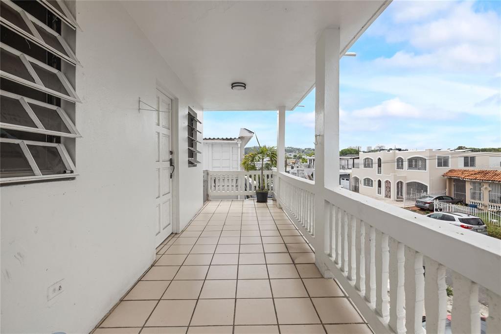 228 Calle 25 Guaynabo, Guaynabo 00969 - Photo 7 of 10 a view of a city from a balcony