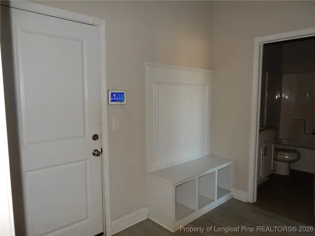a bathroom with a bath tub with a shower