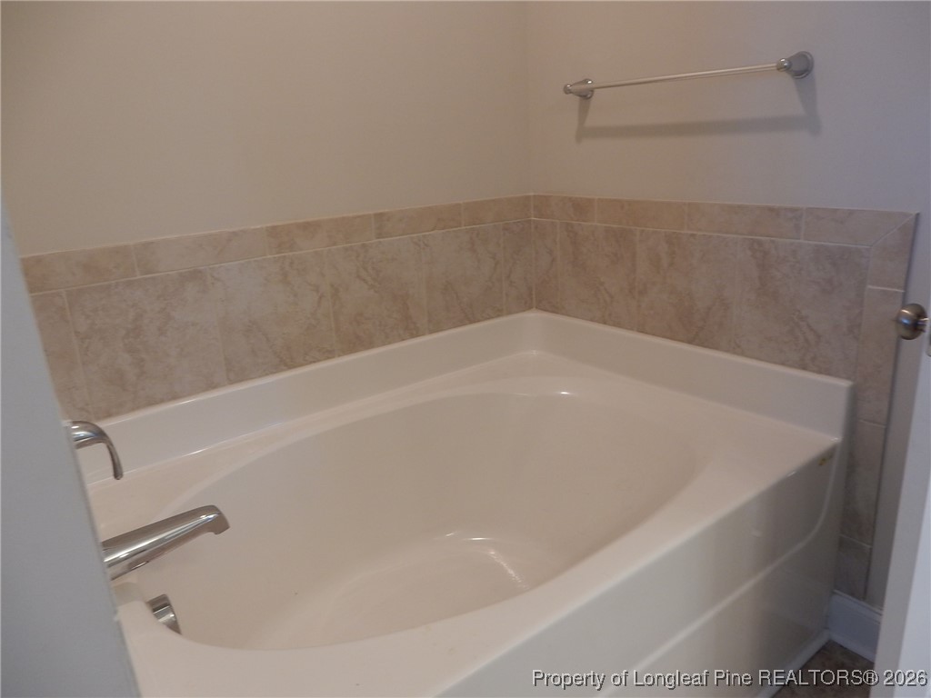 111 South Dakota Court Spring Lake, NC 28390 - Photo 18 of 29 a close view of a bathtub in bathroom