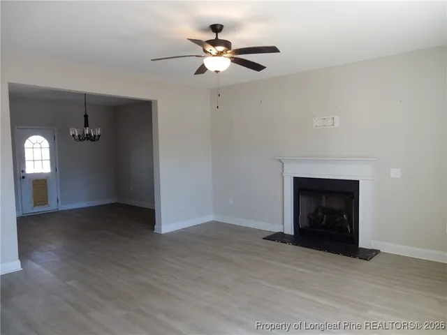 a living room with a fireplace