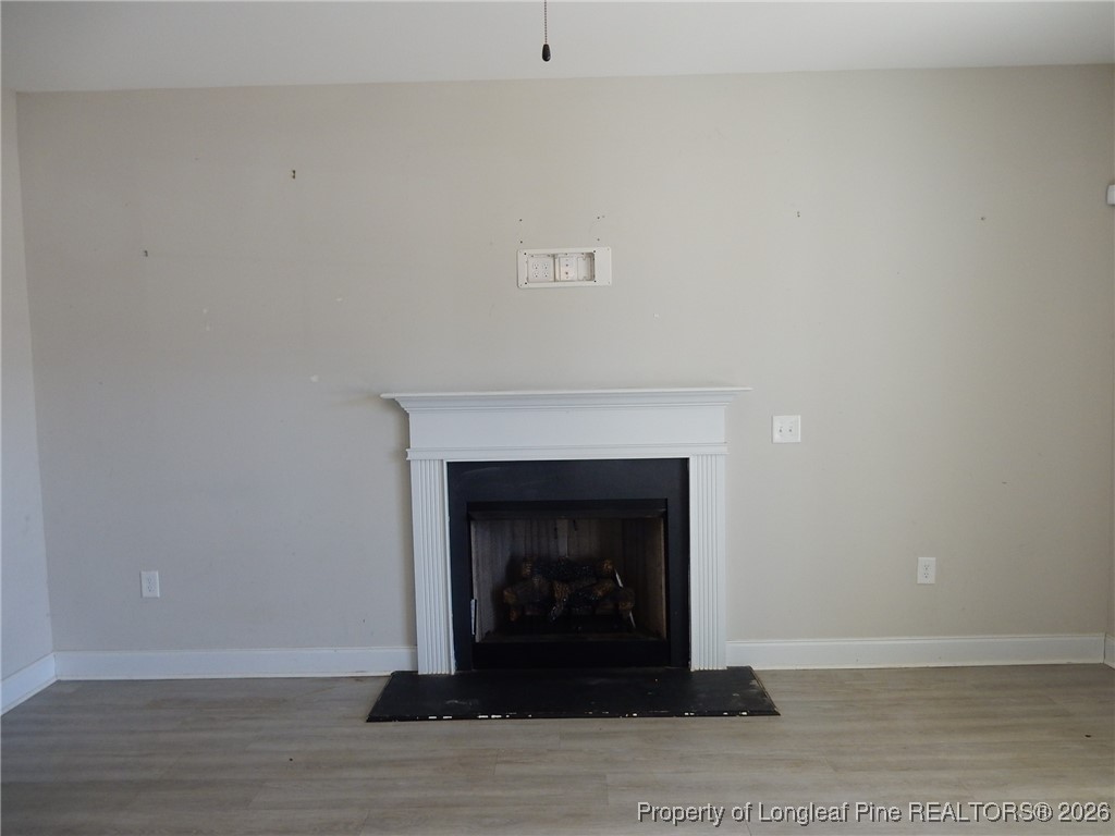 111 South Dakota Court Spring Lake, NC 28390 - Photo 4 of 29 a living room with a fireplace