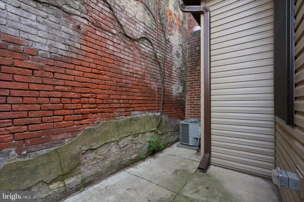 a view of a door and a yard