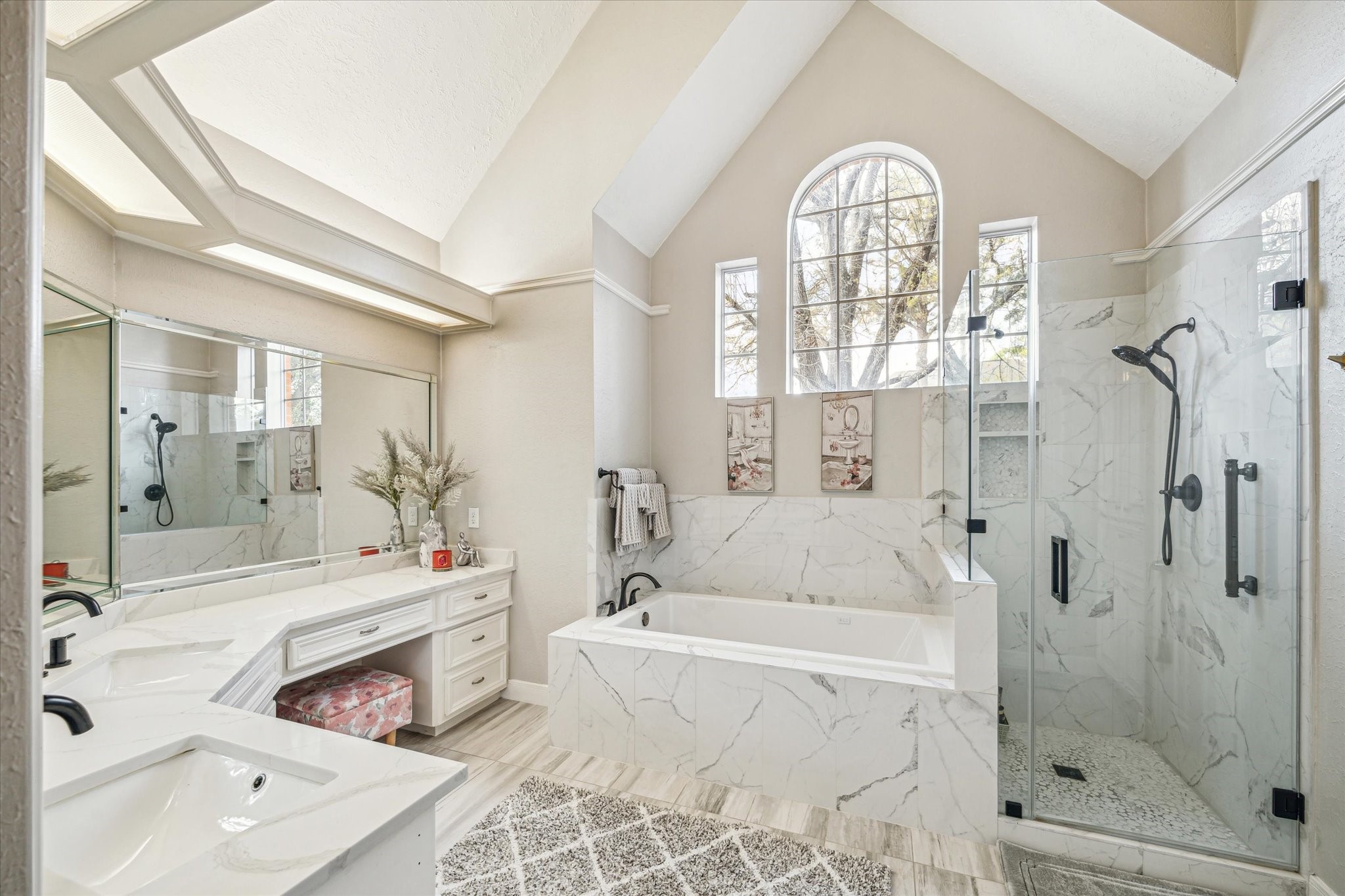 15314 Ripplewind Lane Houston, TX 77068 - Photo 14 of 24 a spacious bathroom with a tub sink and mirror