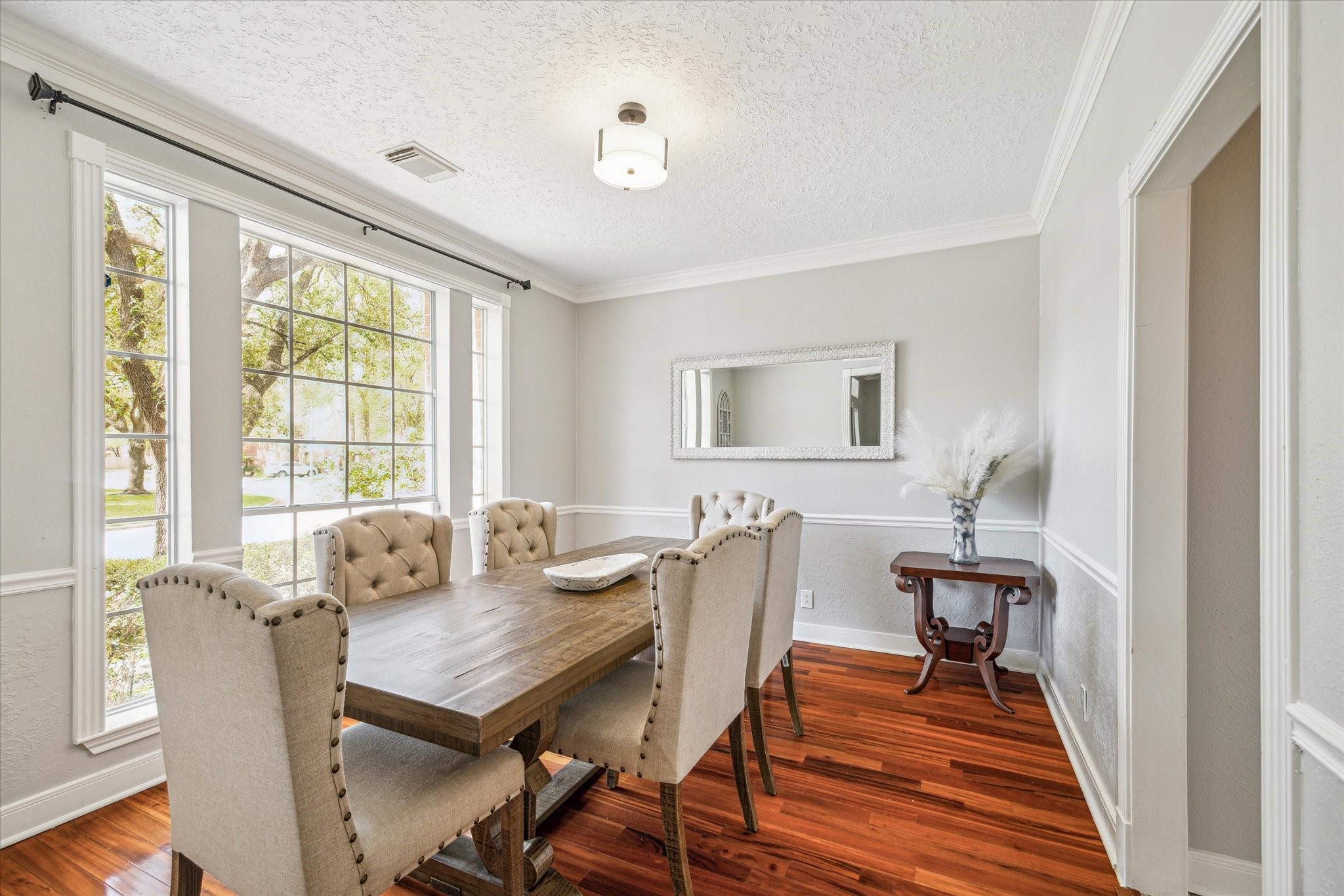 15314 Ripplewind Lane Houston, TX 77068 - Photo 5 of 24 a view of a dining room with furniture window and wooden floor