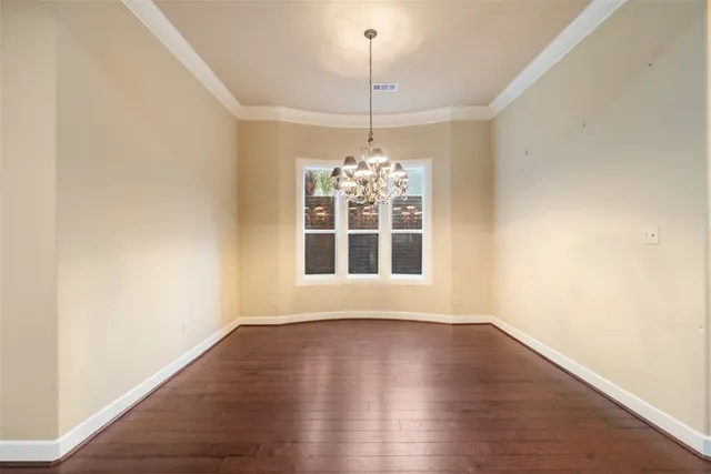 a view of a park with large trees