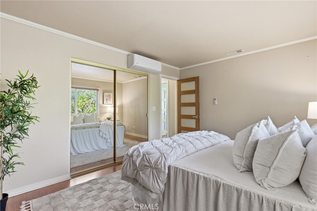 41 Hidden Valley Road Monrovia, CA 91016 - Photo 27 of 51 a bedroom with a bed and a window