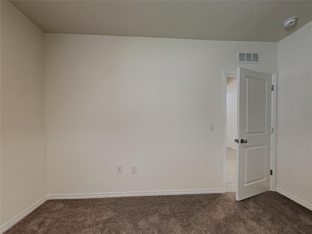 30985 Penny Surf Loop Wesley Chapel, FL 33545 - Photo 11 of 15 an empty room