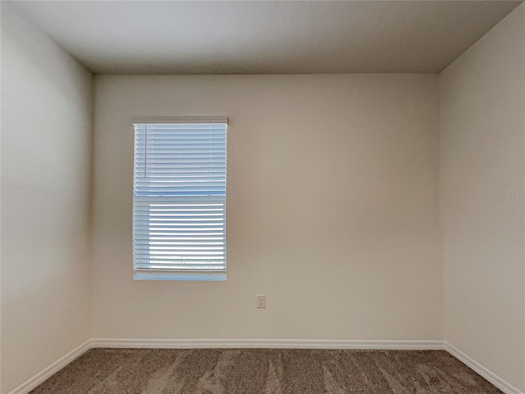 30985 Penny Surf Loop Wesley Chapel, FL 33545 - Photo 10 of 15 a view of a small space with a window