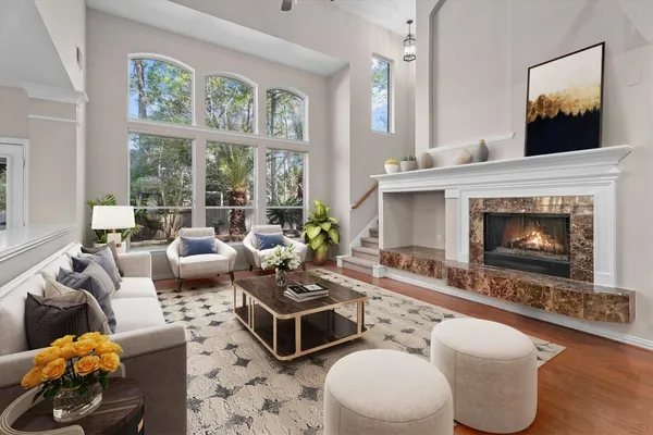 a living room with furniture and a window