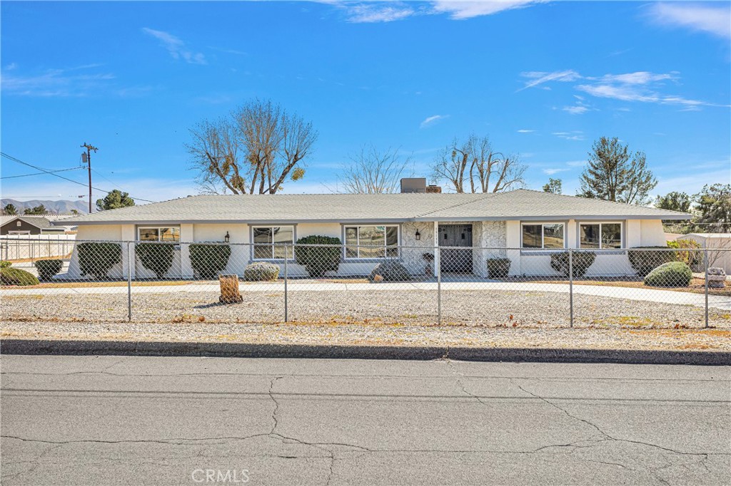 19135 Seneca Road Apple Valley, CA 92307 - Photo 1 of 1 a house view with a outdoor space