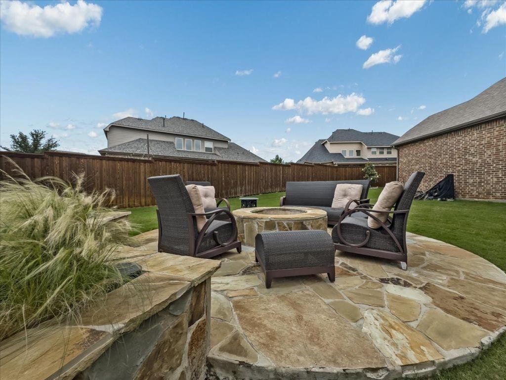 2832 Mona Vale Road Trophy Club, TX 76262 - Photo 35 of 37 a roof deck with table and chairs