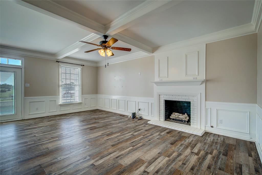 7359 Highway 154 Sulphur Springs, TX 75482 - Photo 18 of 40 Great room has french doors that open onto the pool area, brick fireplace with mantel, lots of molding details!