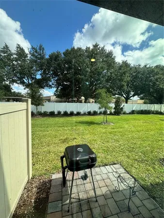 a view of a lake with a yard