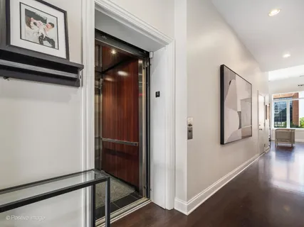 a view of a hallway with closet