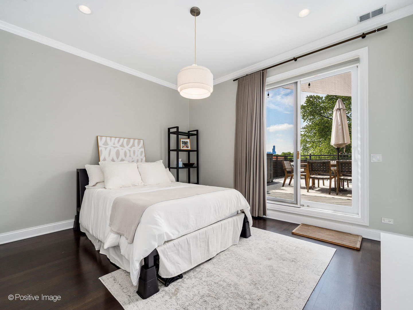 1359 West Fullerton Avenue, Unit PH Chicago, IL 60614 - Photo 22 of 33 a bedroom with a large bed and a large window