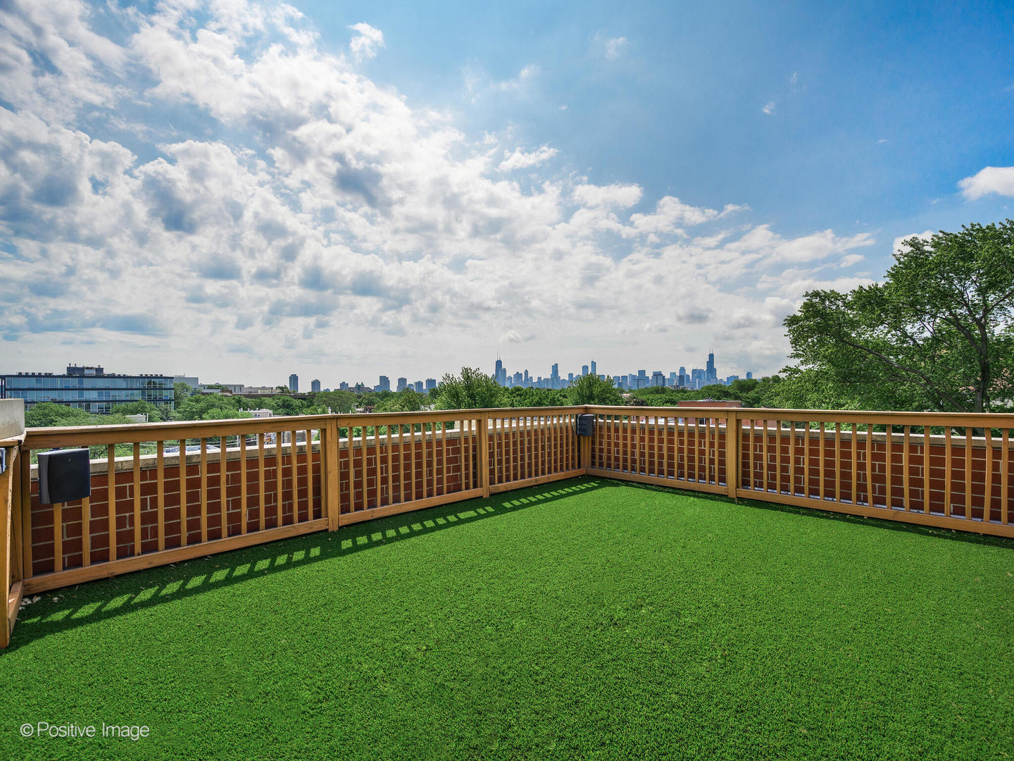 1359 West Fullerton Avenue, Unit PH Chicago, IL 60614 - Photo 31 of 33 a view of a yard with wooden fence