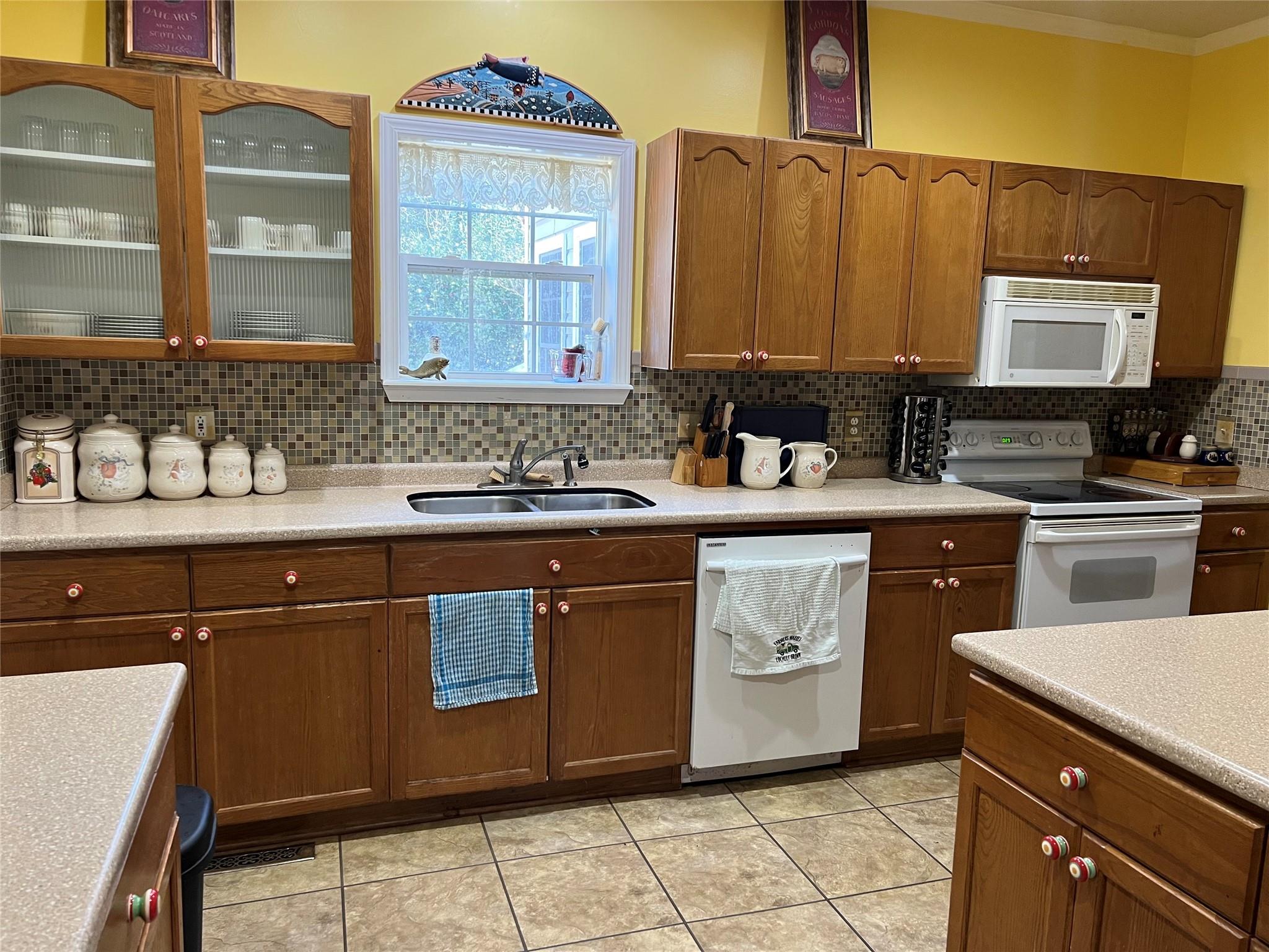 314 Windy Ridge Drive Rutherfordton, NC 28139 - Photo 12 of 46 a kitchen with a sink stove and cabinets