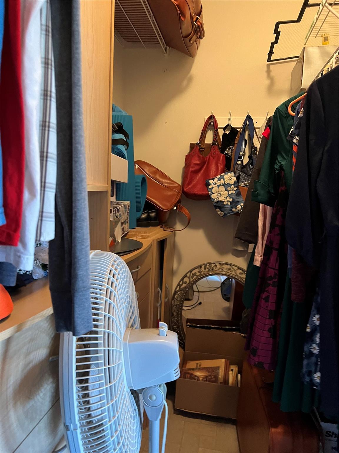 314 Windy Ridge Drive Rutherfordton, NC 28139 - Photo 21 of 46 a view of walk in closet with clothes and shoes