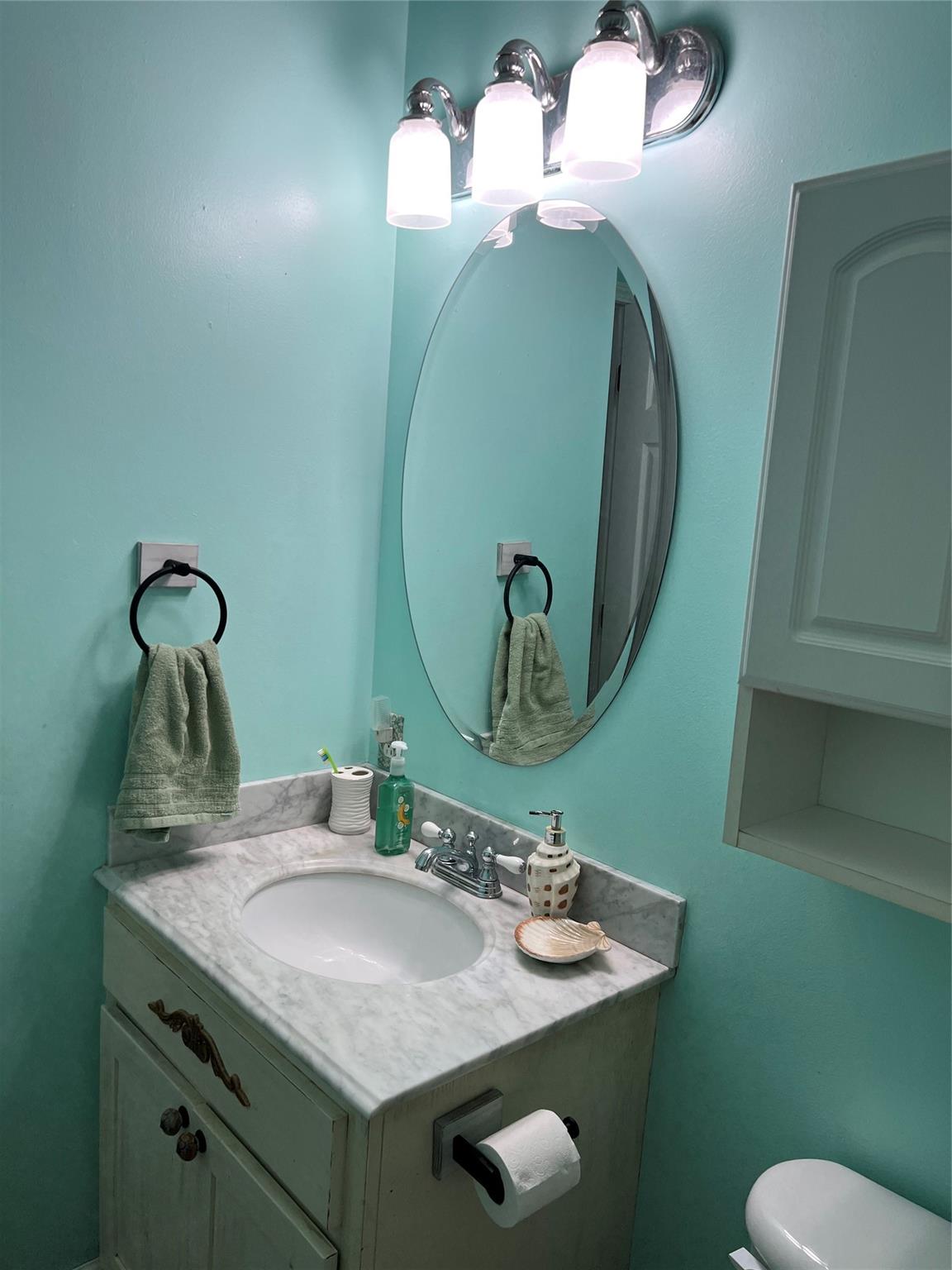 314 Windy Ridge Drive Rutherfordton, NC 28139 - Photo 26 of 46 a bathroom with a granite countertop sink and a mirror